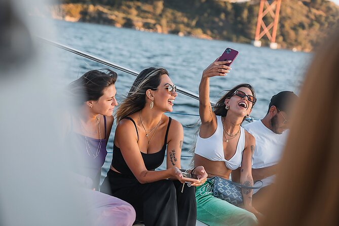 Lisbon: Sunset Catamaran Boat Tour with Music and Drinks - Choosing between the nets and the upper deck
