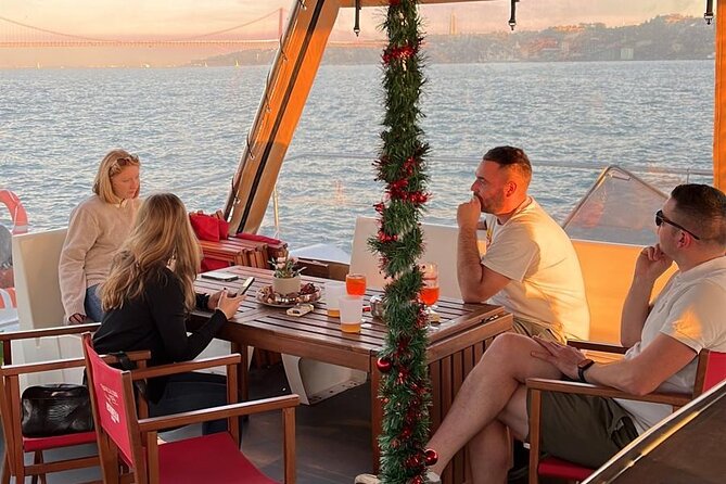 Lisbon: Sunset Catamaran Boat Tour with Music and Drinks - Music, blankets, and the changing evening mood