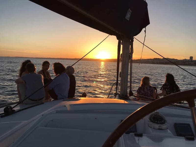 Lisbon: Sunset Catamaran Cruise with Drinks - The catamaran, from sun deck to indoor lounge