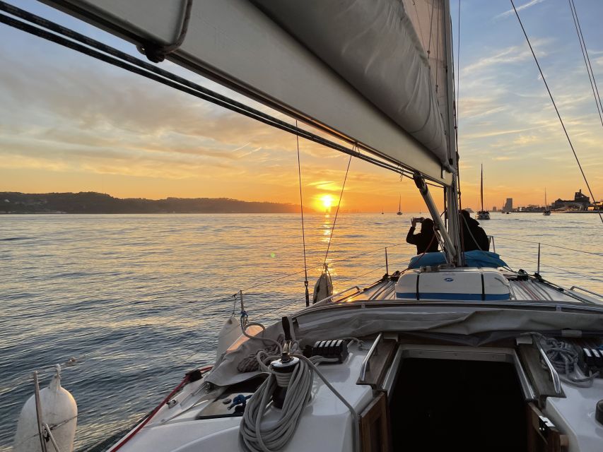 Lisbon: Sunset Sailing Boat Cruise with Wine - Passing beneath the 25 de Abril Bridge