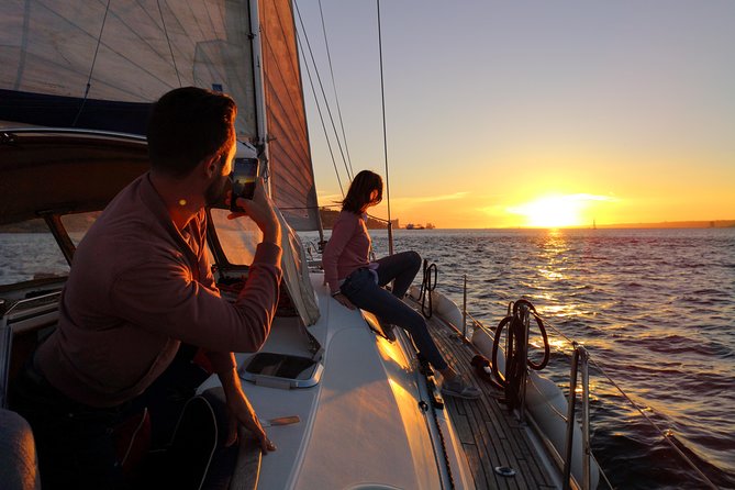 Lisbon Sunset Sailing Tour on Luxury Sailing Yacht with 2 Drinks - Wine, cheese, and the sunset hour