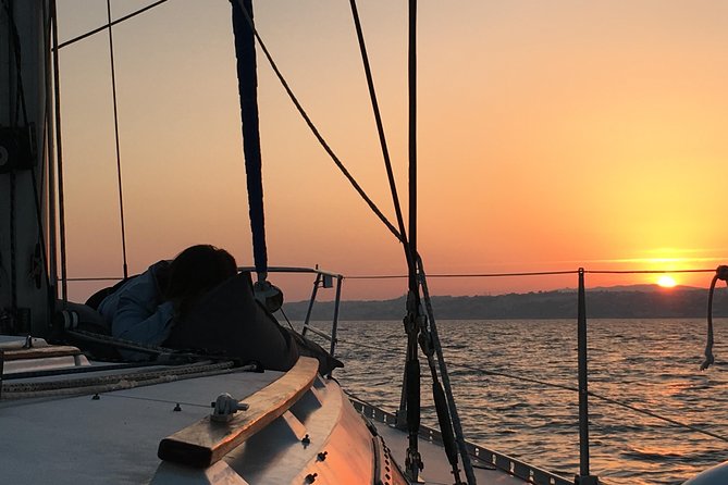 Lisbon Sunset Sailing Tour with White or Rosé Wine and Snacks - Two grand museums seen from the river