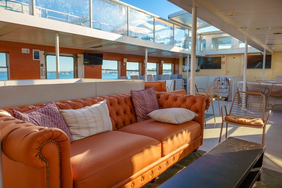 Lisbon: Tagus River Boat Tour with One Drink Included - What the boat experience feels like onboard