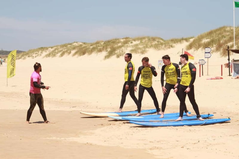 Lisbon: The Surf Instructor - surf lessons with transfer - Getting ready at Praia do Castelo