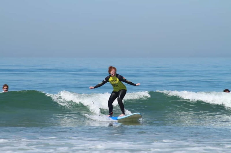Lisbon: The Surf Instructor - surf lessons with transfer - Meeting the van near Titanic Sur Mer cafe