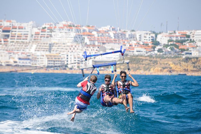 Parasailing from Albufeira Marina by Boat - Seeing the rock formations from above
