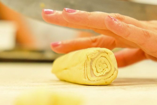Pastel de Nata Masterclass at a Real Bakery in Downtown Lisbon - Laminating the dough and shaping three tart shells