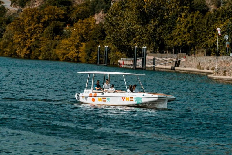 Pinhão: Douro River Solar Boat Tour with Wine Tasting - Leaving Pinhão for the vineyard terraces