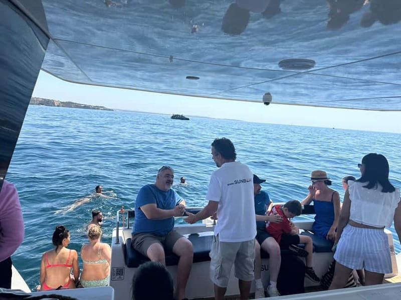 Portimão: Benagil Caves & Golden Coast Eco Catamaran Tour - Entering Benagil Cave and the Smugglers Caves
