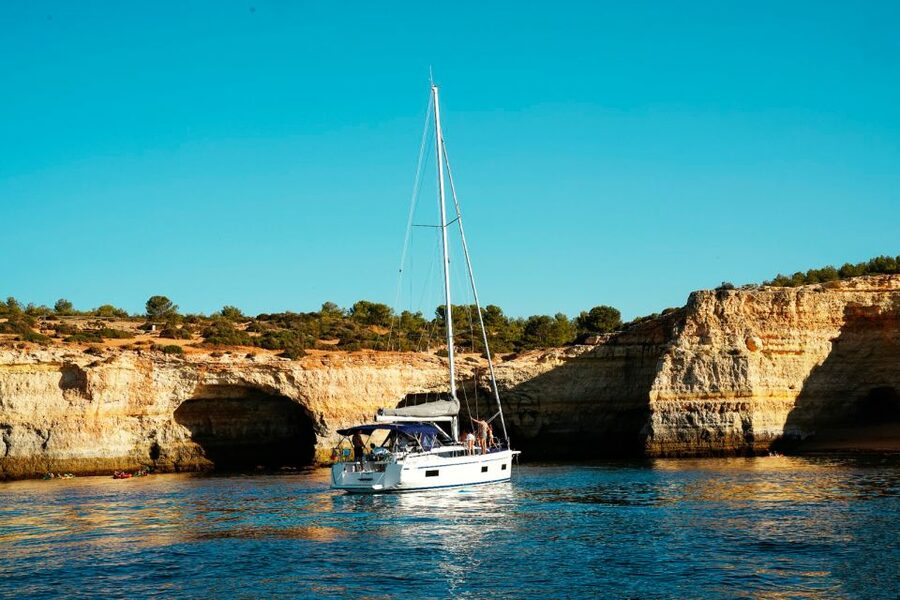 Portimao: Half-Day Sailing Yacht Cruise to the Benagil Caves - A closer look at Benagil and the route question