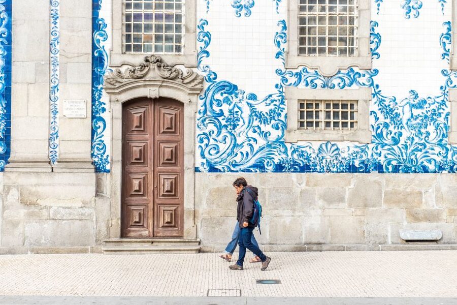 Porto: 3-Hour Guided City Highlights Walking Tour - Clérigos Church and the tower above the rooftops