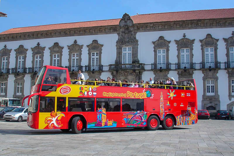 Porto: City Sightseeing Hop-On Hop-Off Bus Tour - Audio commentary, bus timing, and small frustrations