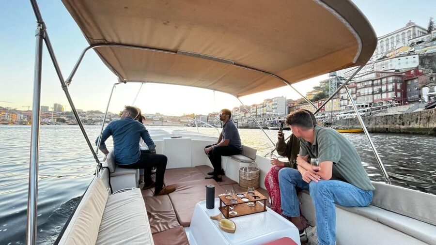 Porto: Douro River Boat Cruise with Port Wine Tasting - The wine tasting, snacks, and guide interaction