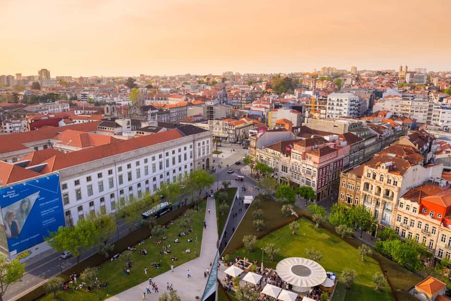 Porto: Private Sunset Walking Tour with Port Wine and Views - Carmo and Carmelitas Church, with a small local story
