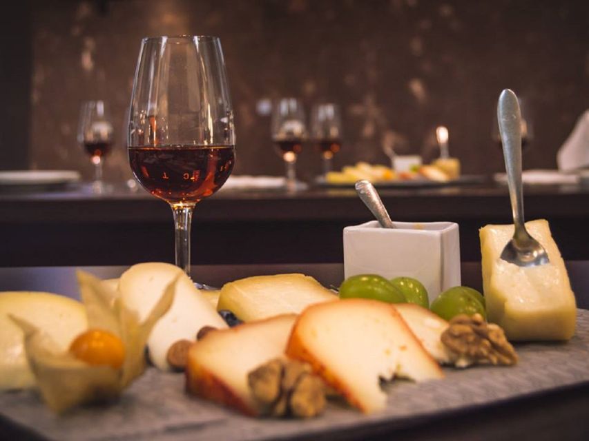 Porto: Private Walking Food Tour with Tastings - The first restaurant stop: cheese, wine, and local tastes