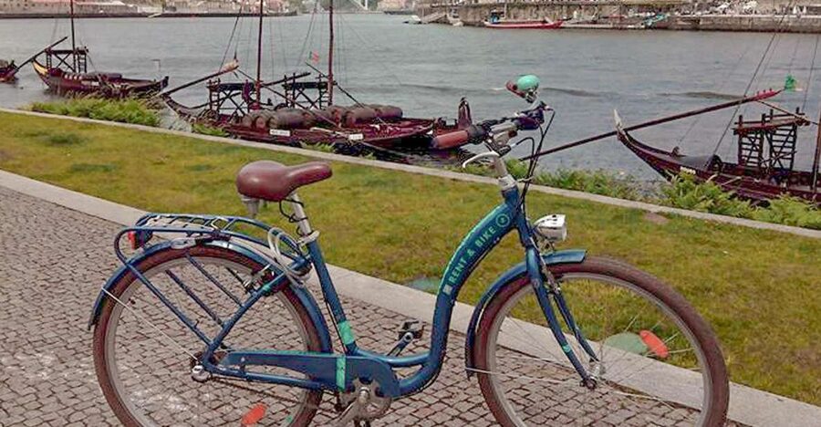 Porto: Self-Guided Bike and Boat Tour with Port Wine Tasting - Starting across Dom Luís I Bridge