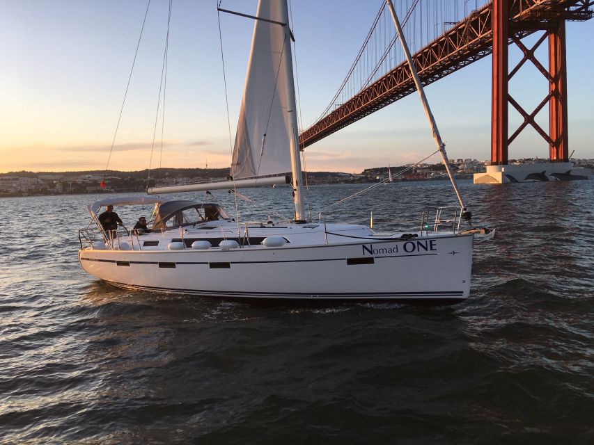 Private Lisbon Sightseeing Sailing Boat Tour with Locals - A welcome drink and a relaxed onboard pace