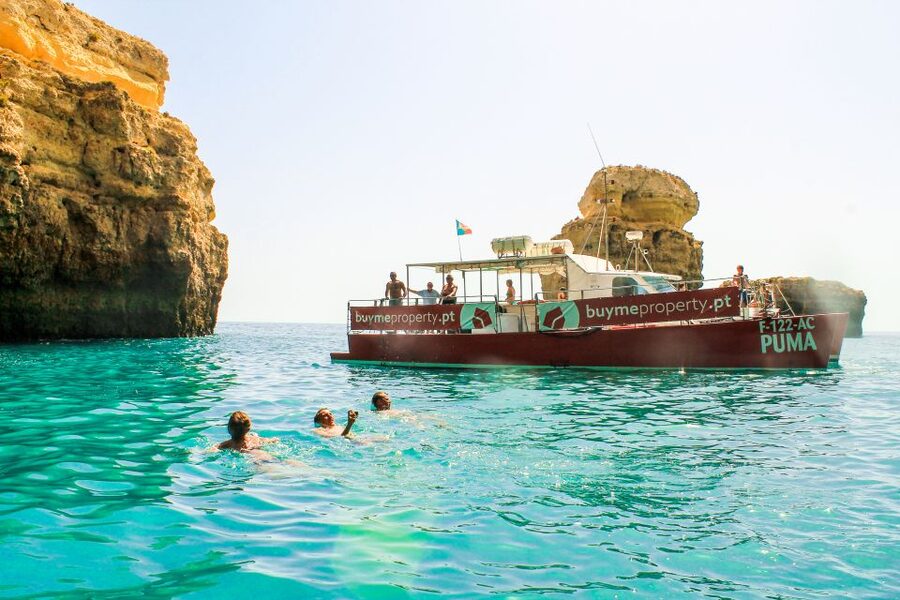 Quarteira: Benagil Cave Guided Catamaran Day Cruise & Drink - From Vilamoura Marina to the open Algarve coast