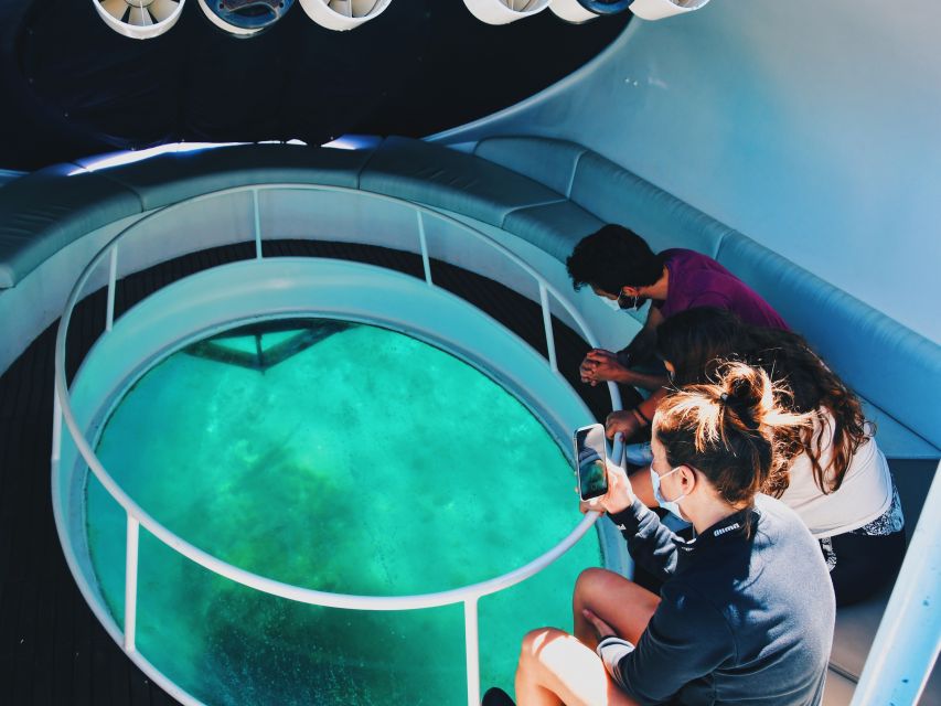 São Miguel: Glass Bottom Boat Tour with Snorkeling - Seeing marine life through the glass floor