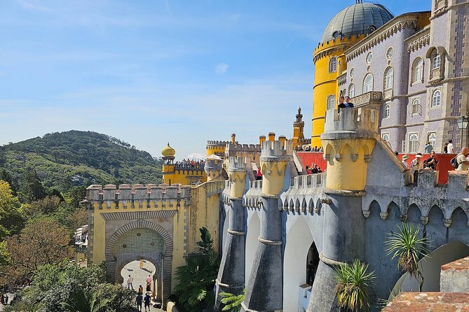 Sintra, Pena Palace, Quinta da Regaleira & Cascais Group Tour - Cascais offers an hour and a half by the sea