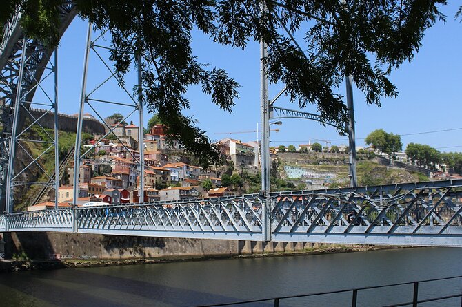 Wine Tasting with Tapas Walking Tour in Porto - Crossing the bridge and reading the city